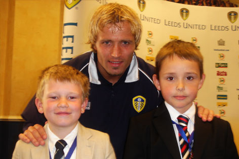 Cameron Harrison, William Newby with Michael Gray of Leeds United Cameron Harrison, William Newby with Michael Gray of Leeds United
